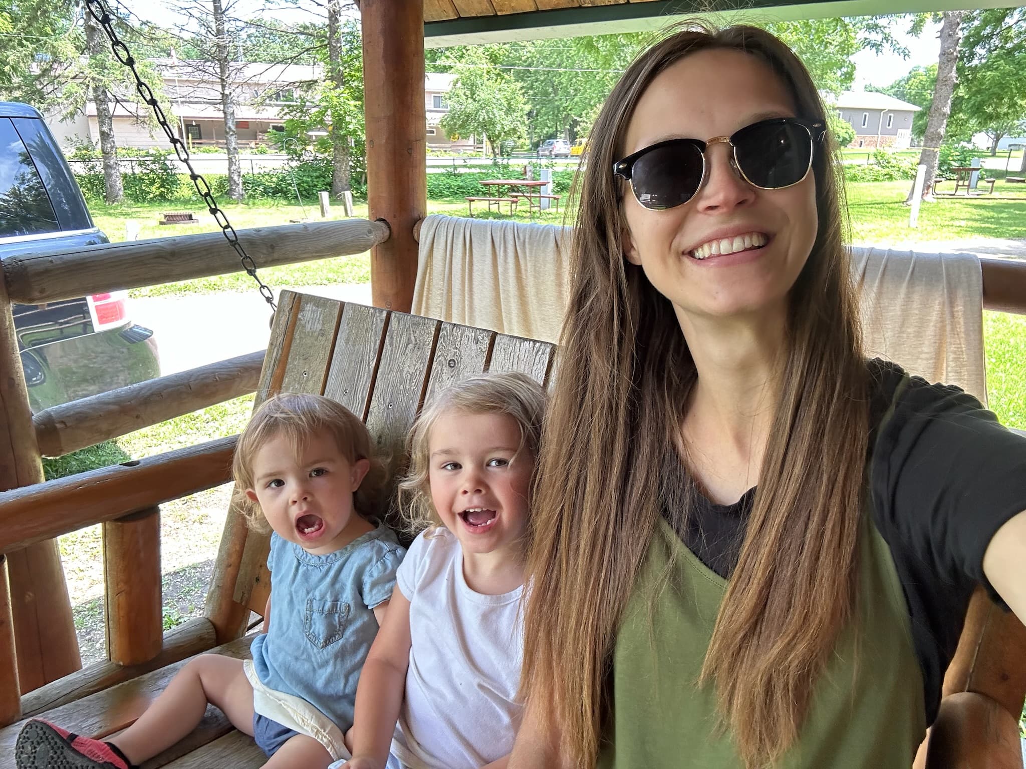 Family selfie on the cabin porch