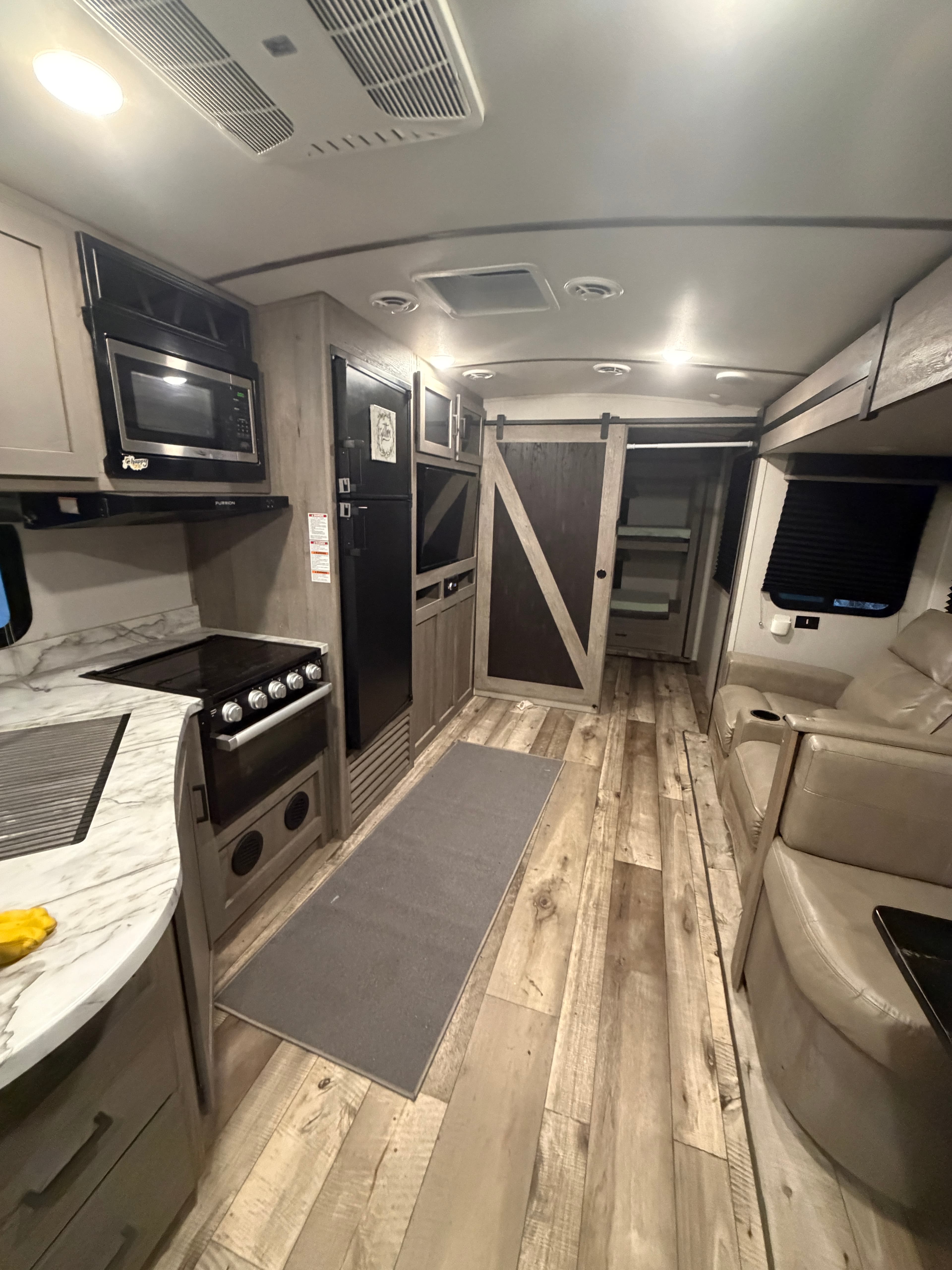 Outback Ultralite RV living area at Camp Everyday Winona