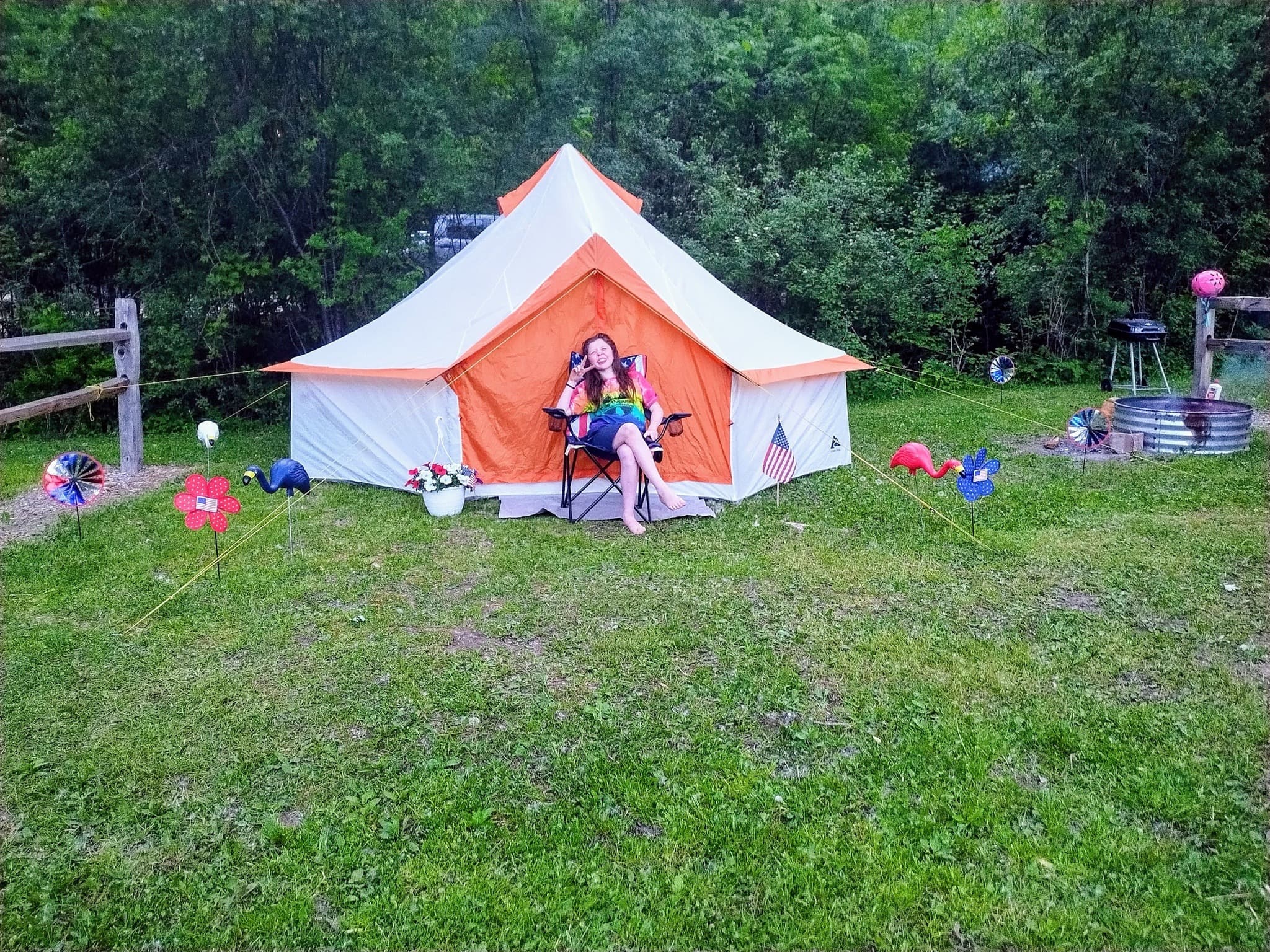 Tent set up at a wooded Camp Everyday Winona campsite